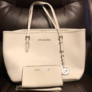 Small white Michael Kors purse and matching wallet